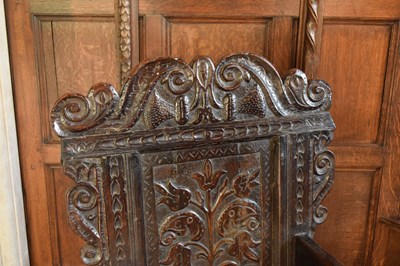 Lot 20 - Charles II oak panel-back open armchair
