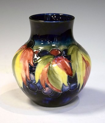 Lot 382 - William Moorcroft pottery Leaf and Berry pattern vase
