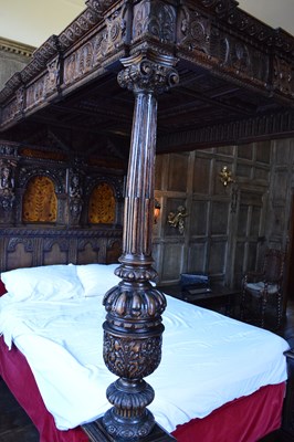 Lot 63 - Impressive carved oak and marquetry-inlaid tester bed