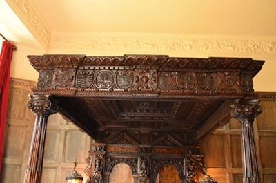 Lot 63 - Impressive carved oak and marquetry-inlaid tester bed