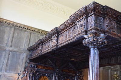 Lot 63 - Impressive carved oak and marquetry-inlaid tester bed