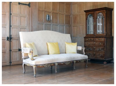 Lot 97 - Early 20th Century carved beech and parcel-gilt settee