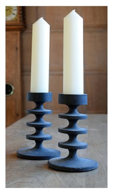 Lot 135 - Robert Welch, pair of ‘Hobart’ cast iron candlesticks