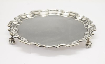 Lot 127 - George V silver piecrust tray