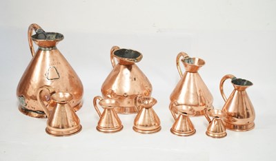 Lot 433 - Set of copper jugs