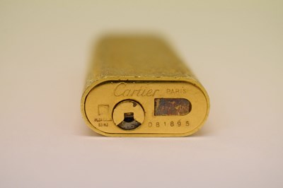 Lot 227 - Cartier - Gold plated pocket lighter