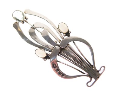 Lot 41 - Edwardian silver brooch set two opals