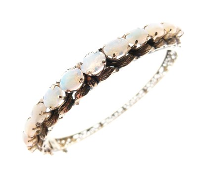 Lot 313 - Opal hinged bangle, possibly of Sri Lankan origin