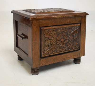 Lot 620 - Oak floor standing box with carved panels