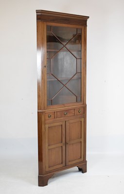 Lot 594 - Late 19th Century mahogany two-section, double corner cupboard