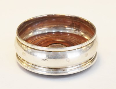 Lot 89 - Elizabeth II modern silver wine/ bottle coaster