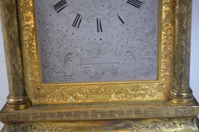 Lot 562 - Unusual mid 19th Century English engraved  gilt brass carriage clock