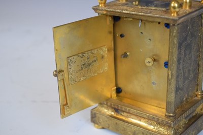 Lot 562 - Unusual mid 19th Century English engraved  gilt brass carriage clock