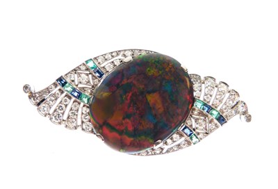 Lot 330 - Black opal, diamond, calibré emerald and sapphire brooch