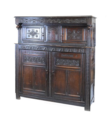 Lot 172 - Charles II oak press or court cupboard