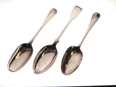 Lot 130 - Two George II silver Hanoverian spoons and a George V fiddle pattern tablespoon