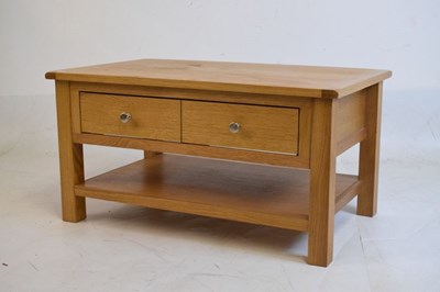 Lot 650 - Modern light oak low side table