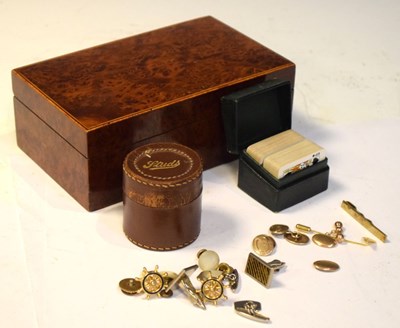 Lot 630 - Two pairs gold plated cufflinks, etc in a table top box
