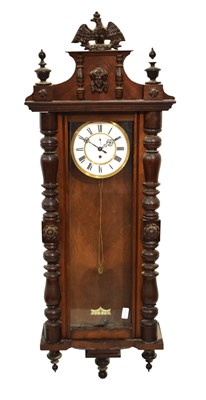 Lot 448 - Walnut-cased single weight Vienna wall clock