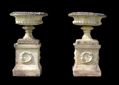 Lot 218 - Pair of composition stone garden pedestal urns