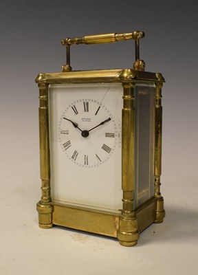 Lot 459 - Brass carriage clock with white enamel dial