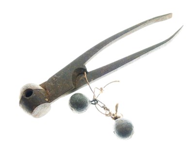 Lot 197 - Pincer bullet mould, 16cm long, together with two lead bullets