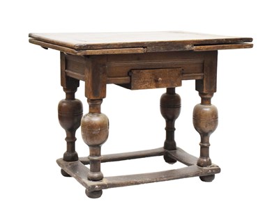 Lot 177 - Small 17th Century Continental oak draw-leaf table