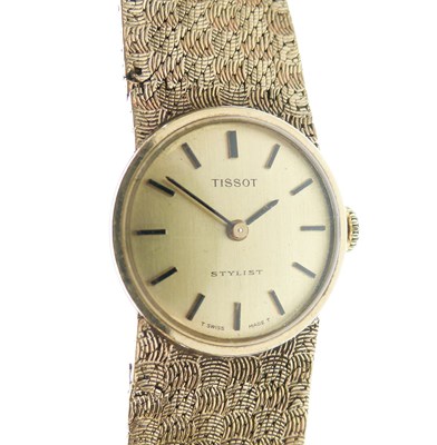Lot 61 - Tissot- Lady's Stylist 9ct gold bracelet watch