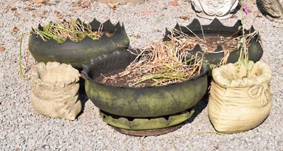 Lot 634 - Three 'tyre' planters and two novelty composite stone planters in the form of a sack