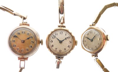 Lot 69 - Three lady's 9ct gold wristwatches, two on plated bracelets