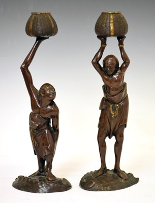 Lot 495 - Pair of Japanese bronzed figural candle sticks depicting Ashinaga and Tenaga