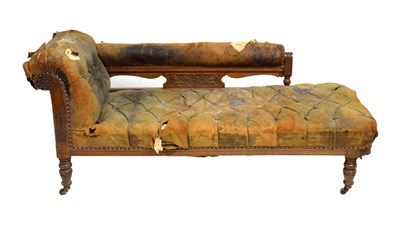 Lot 690 - Edwardian oak chaise longue