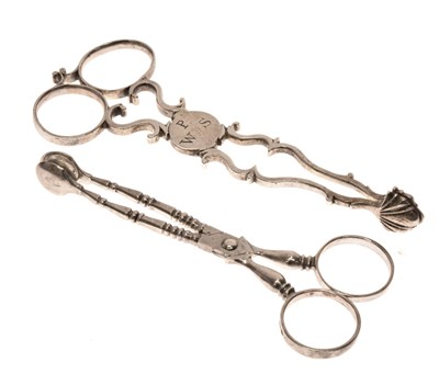 Lot 125 - Pairs of Georgian silver sugar nips, together with an Elizabeth II pair