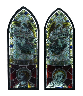 Lot 685 - Pair of lancet arched stained glass panels