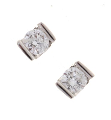 Lot 49 - Pair of single stone diamond ear studs