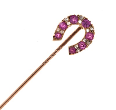 Lot 55 - A diamond and ruby horseshoe stick pin