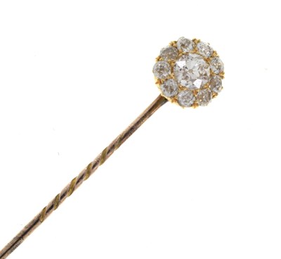 Lot 63 - A diamond cluster stick pin