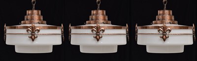 Lot 667 - Set of three opaque glass Art Deco pendant lights