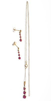 Lot 117 - Ruby and diamond pendant and earring set