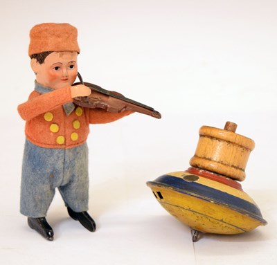 Lot 391 - Schuco clockwork model of a violinist in felt costume and spinning top toy
