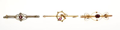 Lot 88 - Three yellow metal bar brooches