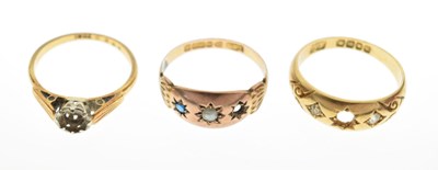 Lot 20 - Three gold rings comprising an 18ct gold gypsy set ring