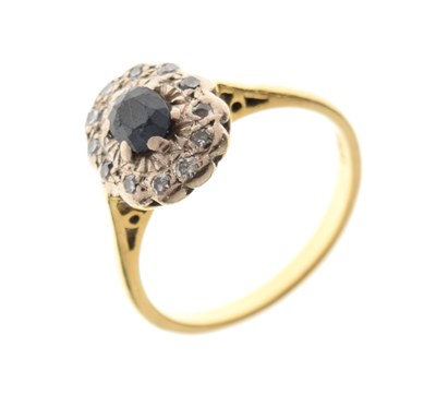 Lot 28 - Sapphire and diamond cluster ring