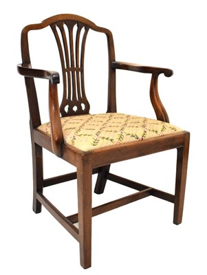 Lot 722 - George III 'Country Hepplewhite' style elbow chair