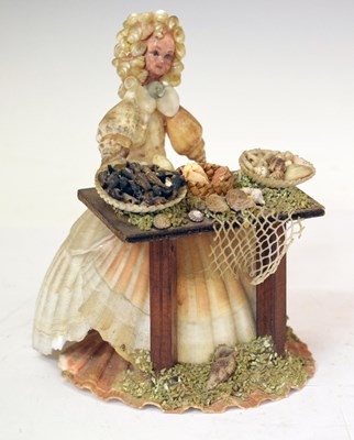 Lot 291 - 20th century shellwork figure of seafood seller