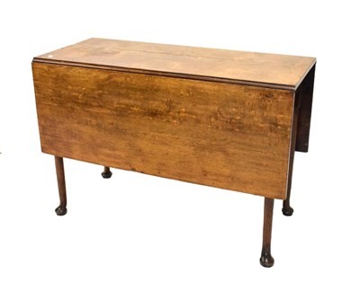 Lot 725 - George III oak drop-leaf table