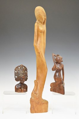 Lot 516 - South East Asian carved figure, together with two Indonesian figures