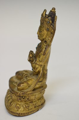 Lot 465 - Small and fine early Tibetan gilt bronze figure of a bodhisattva