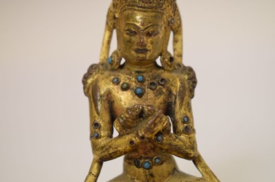 Lot 465 - Small and fine early Tibetan gilt bronze figure of a bodhisattva