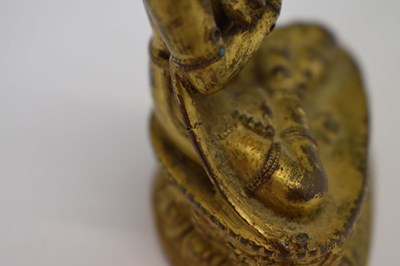 Lot 465 - Small and fine early Tibetan gilt bronze figure of a bodhisattva